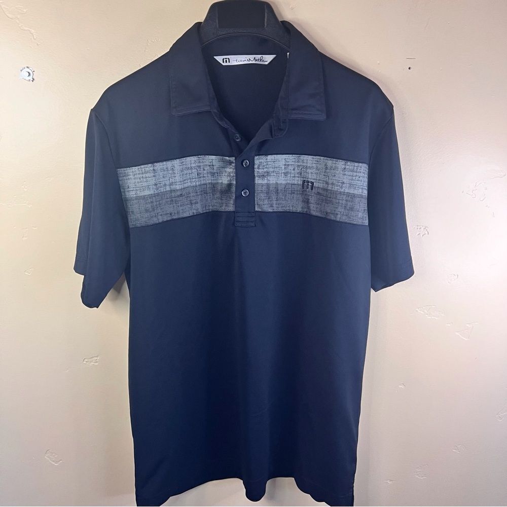 Travis Mathew Black Polo with Gray Chest Stripe